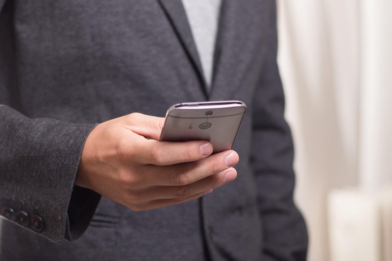 Businessman staying informed